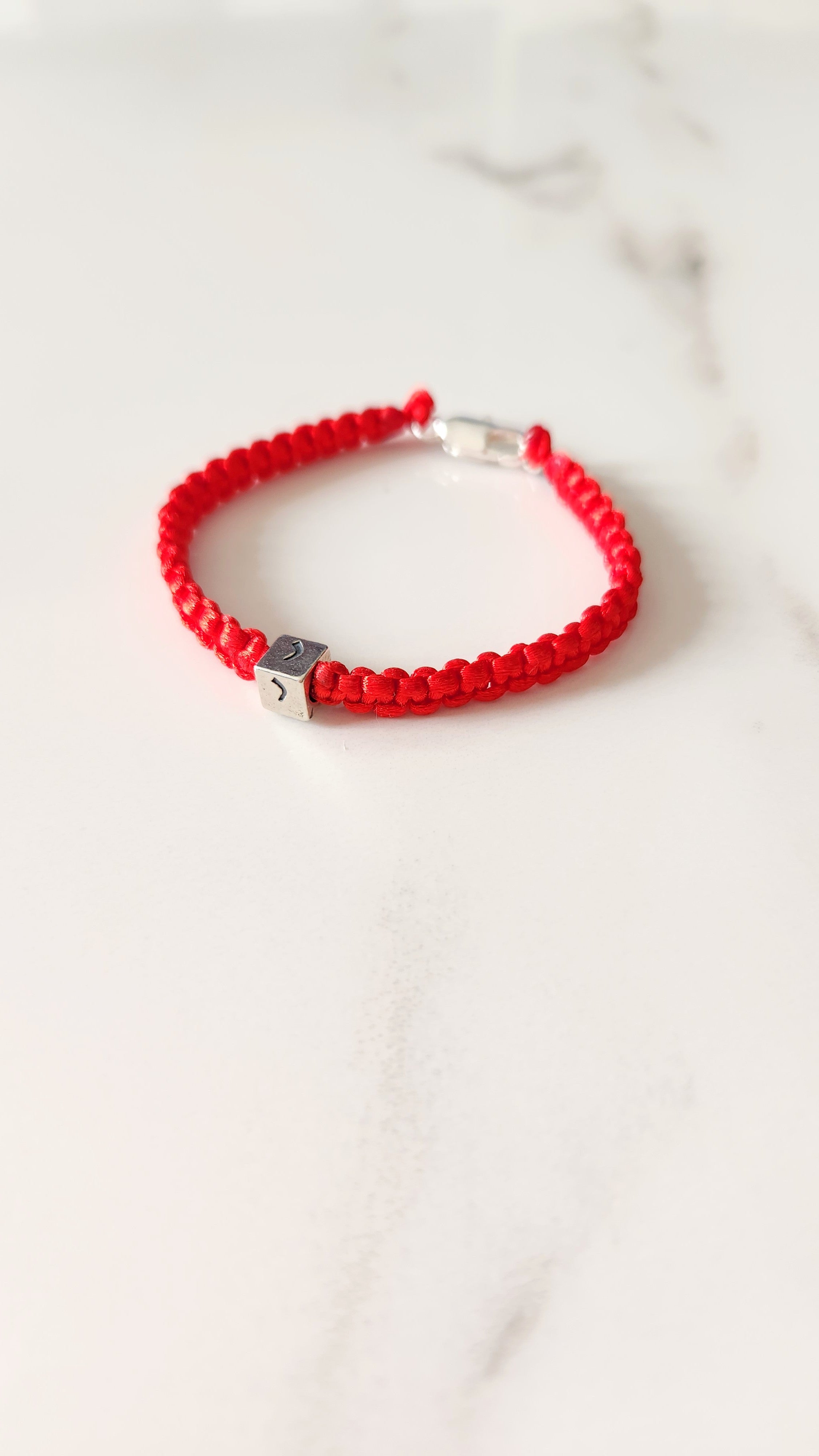 Divinidad Cordon Rojo