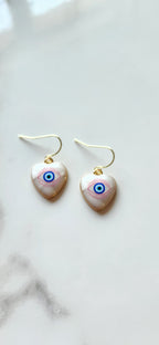 💙 Aretes Corazón con Ojo Azul Protector – Amor Propio, Intuición y Defensa Espiritual