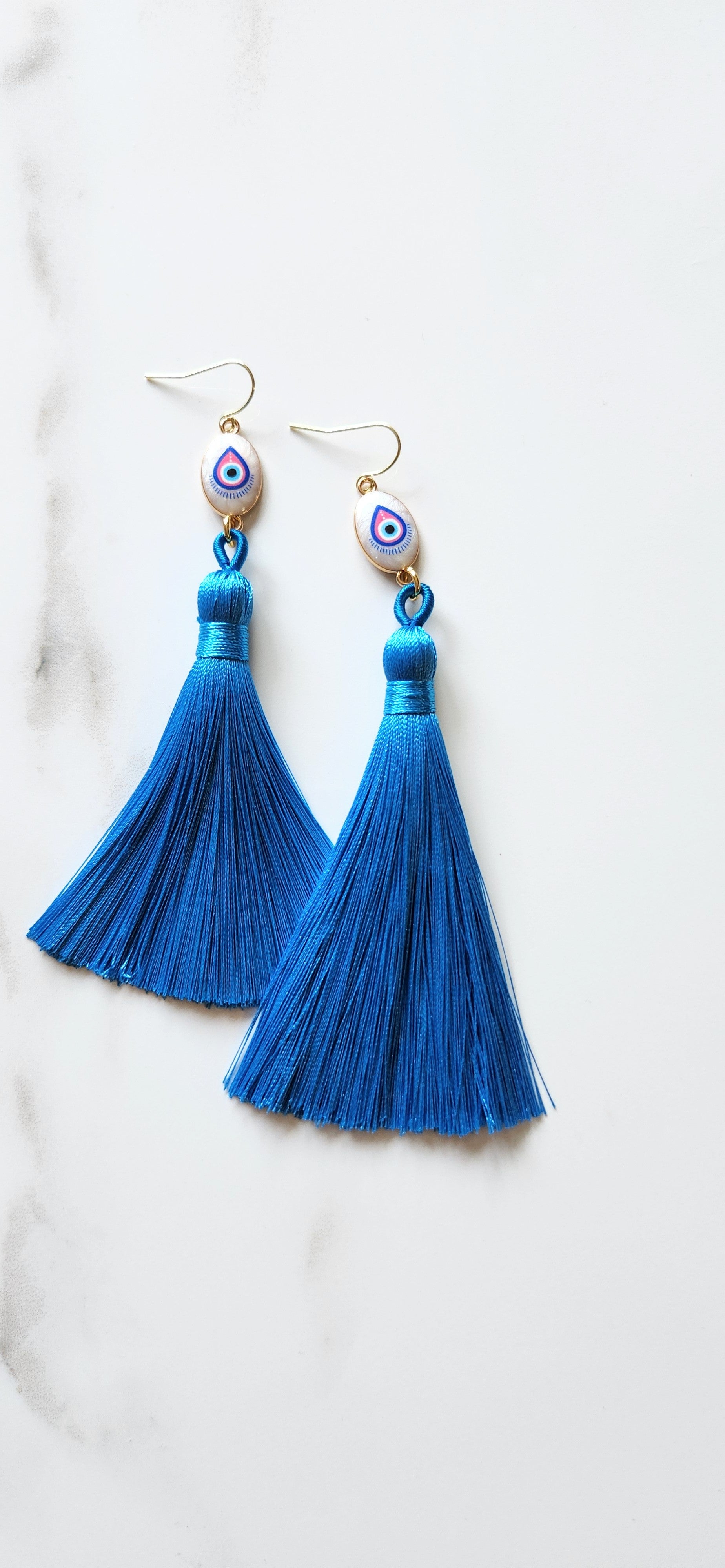 🧿 Aretes con Borlas Azules y Ojo Protector – Estilo y Energía de Protección