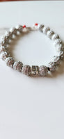 Pulsera de Cristales Plateados con Letra Hebrea "נ" (Nun)